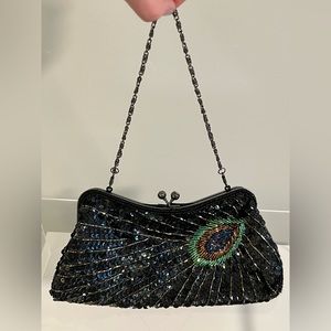Beaded peacock feather clutch
